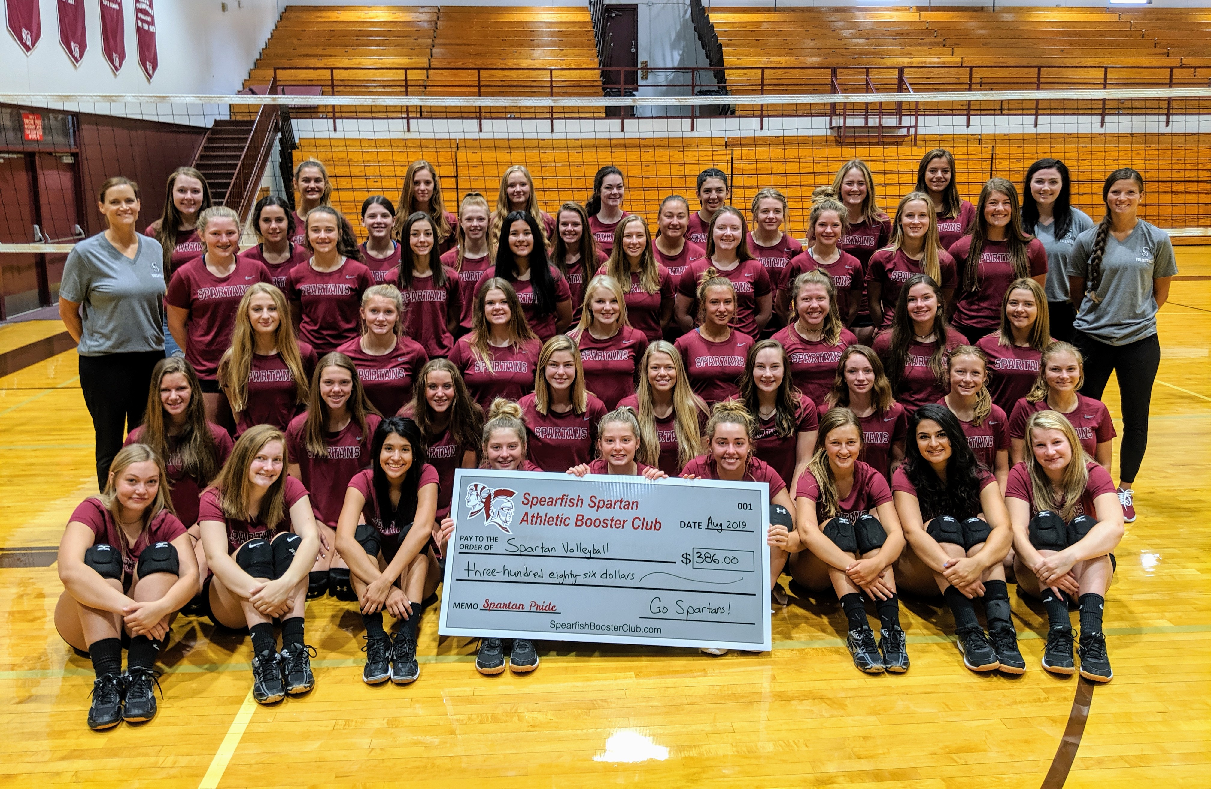 The Spearfish Spartan Athletic Booster Club presented funding to the Spearfish Spartan Volleyball Team to purchase an iPad and accessories. They will use the equipment to record practices and matches to help improve their game.     The Booster Club is pleased to support the Volleyball team to reach their full potential this season!