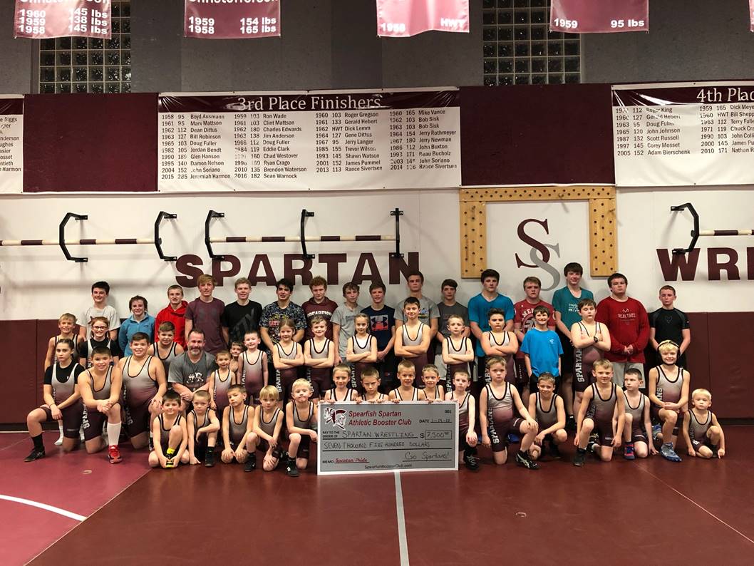Pictured are members of the Spearfish Youth Wrestling program and the Spearfish High School Wrestlers with Coach John Bokker, the head wrestling coach at the high school.